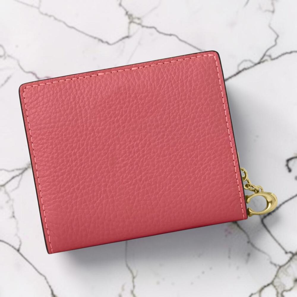 Coach X Peanuts Leather Snap Wallet With Lucy in Bright Coral CBN89 - Picture 2 of 4